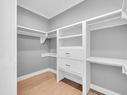 a view of a swimming pool with a yard