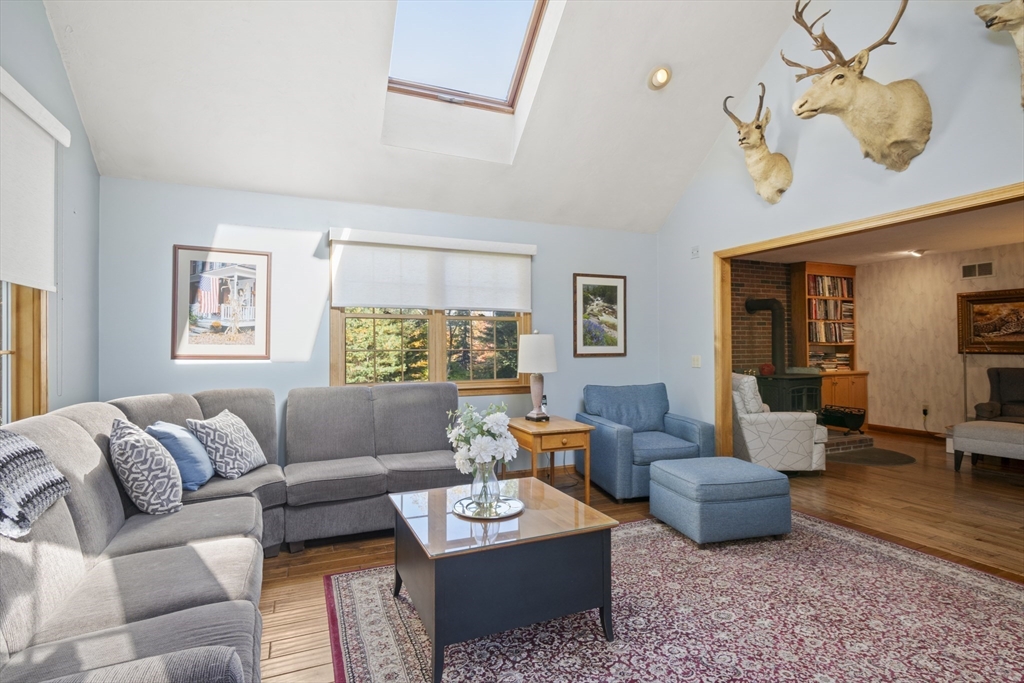 562 South Street Shrewsbury, MA 01545 - Photo 12 of 40 a living room with furniture ceiling fan and a rug