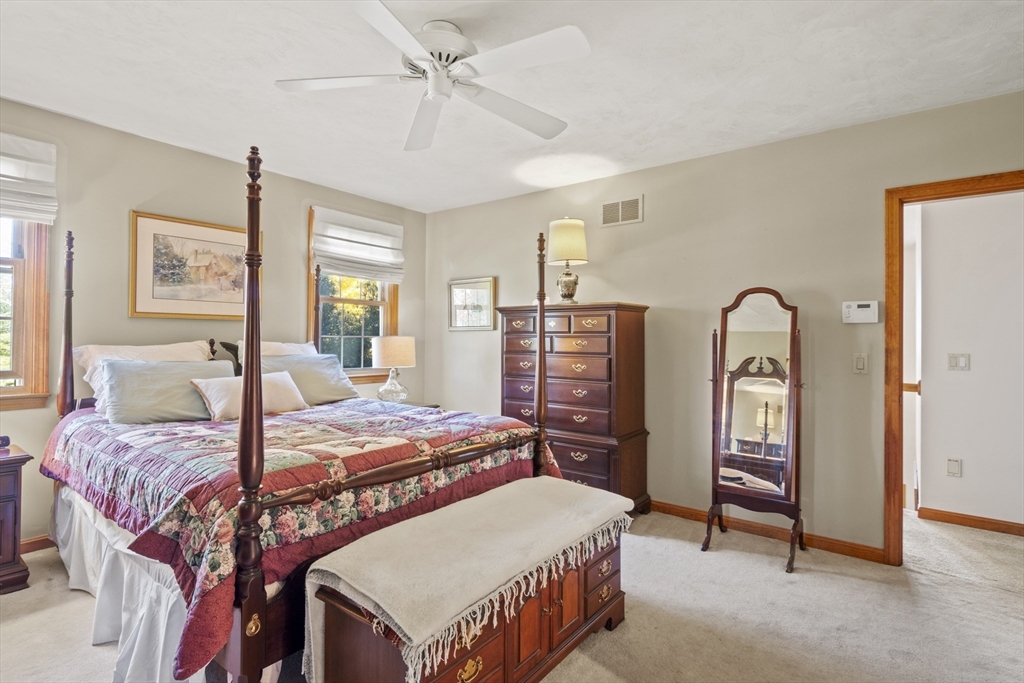 562 South Street Shrewsbury, MA 01545 - Photo 20 of 40 a bedroom with a bed and a dresser in it