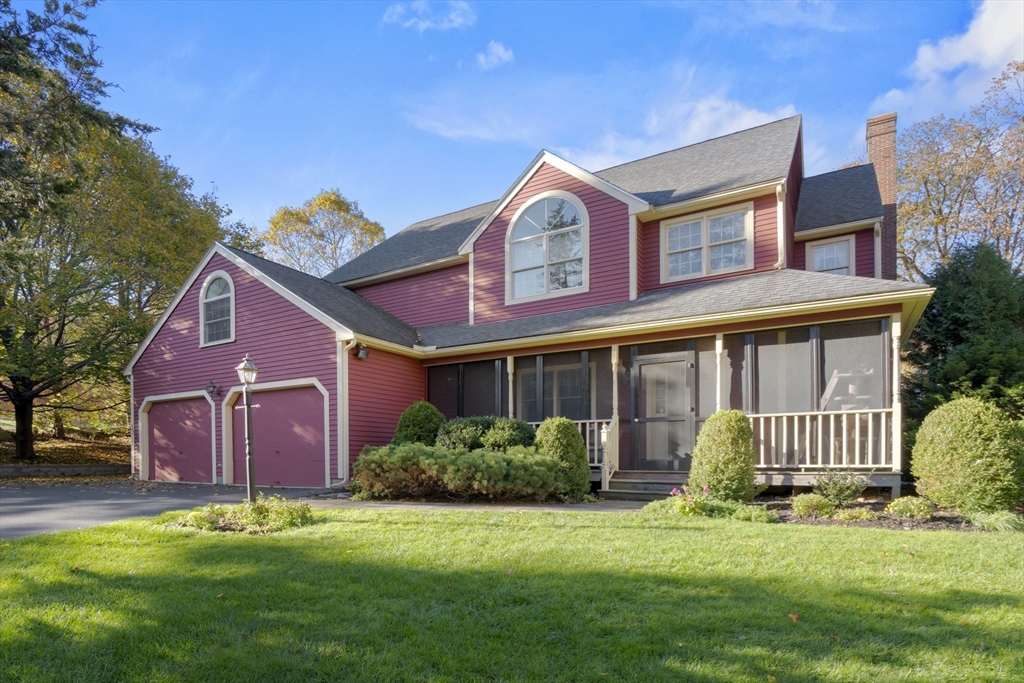 562 South Street Shrewsbury, MA 01545 - Photo 2 of 40 a front view of a house with garden
