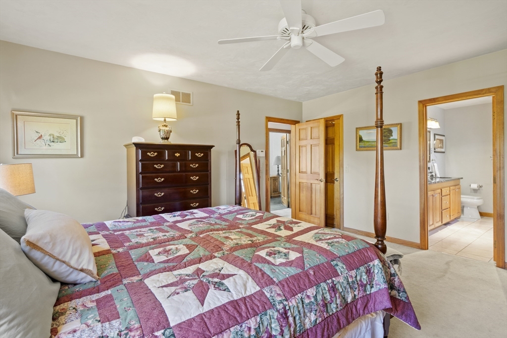 562 South Street Shrewsbury, MA 01545 - Photo 21 of 40 a bedroom with a bed and a dresser