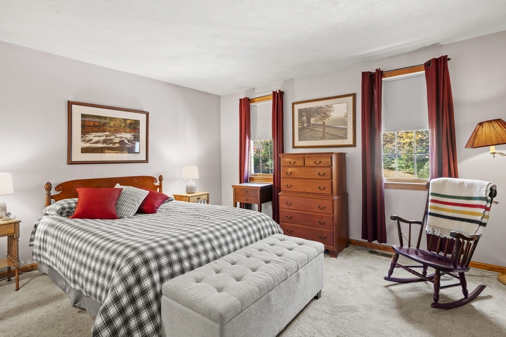 562 South Street Shrewsbury, MA 01545 - Photo 27 of 40 a bedroom with a bed and a dresser