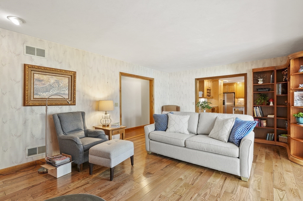 562 South Street Shrewsbury, MA 01545 - Photo 10 of 40 a living room with furniture and a wooden floor