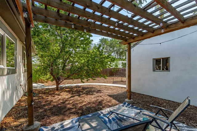 a backyard of a house with lots of green space