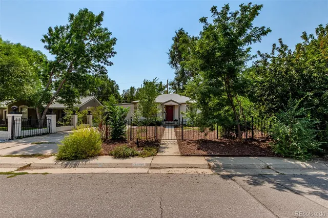 front view of a house with a street
