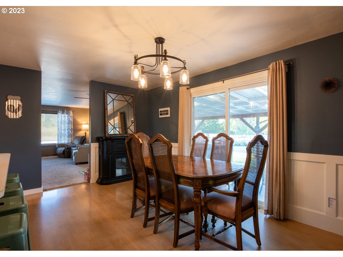 5279 Jasper Road Springfield, OR 97478 - Photo 13 of 48 a view of a dining room with furniture window and outside view