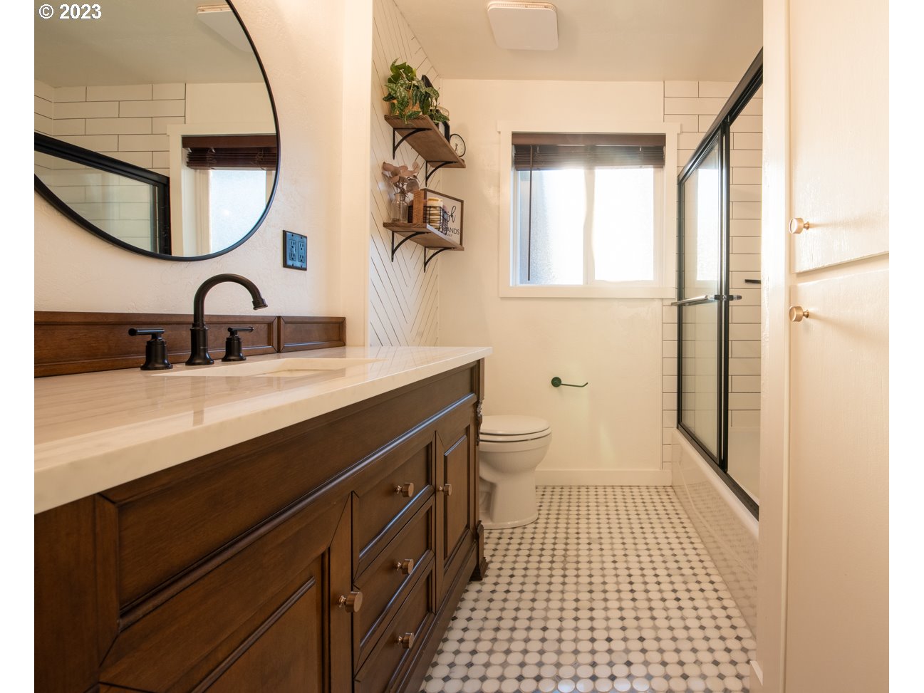 5279 Jasper Road Springfield, OR 97478 - Photo 25 of 48 a bathroom with a sink and a mirror