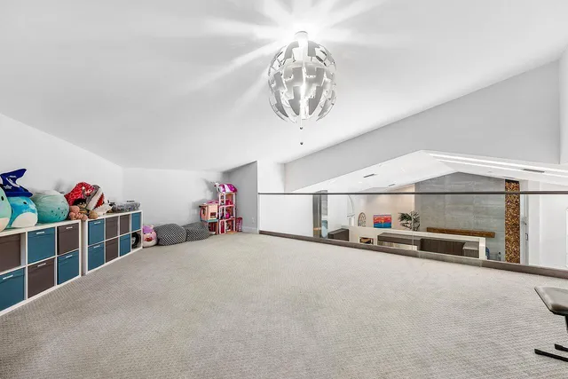 wooden floor with a ceiling fan