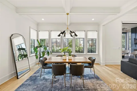 a open kitchen with a table and chairs