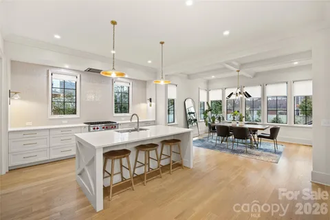 a spacious bathroom with a double vanity sink and a mirror