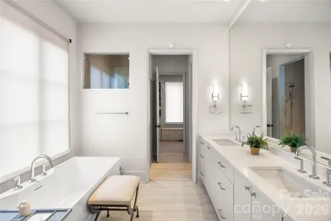 a kitchen that has a sink and a stove in it