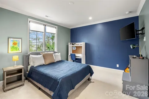 a bathroom with a shower and a sink