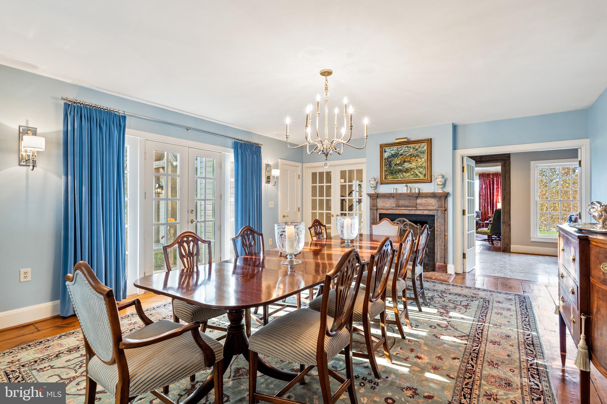 2310 Gadd Road Cockeysville, MD 21030 - Photo 20 of 83 a view of a dining room with furniture a chandelier and wooden floor