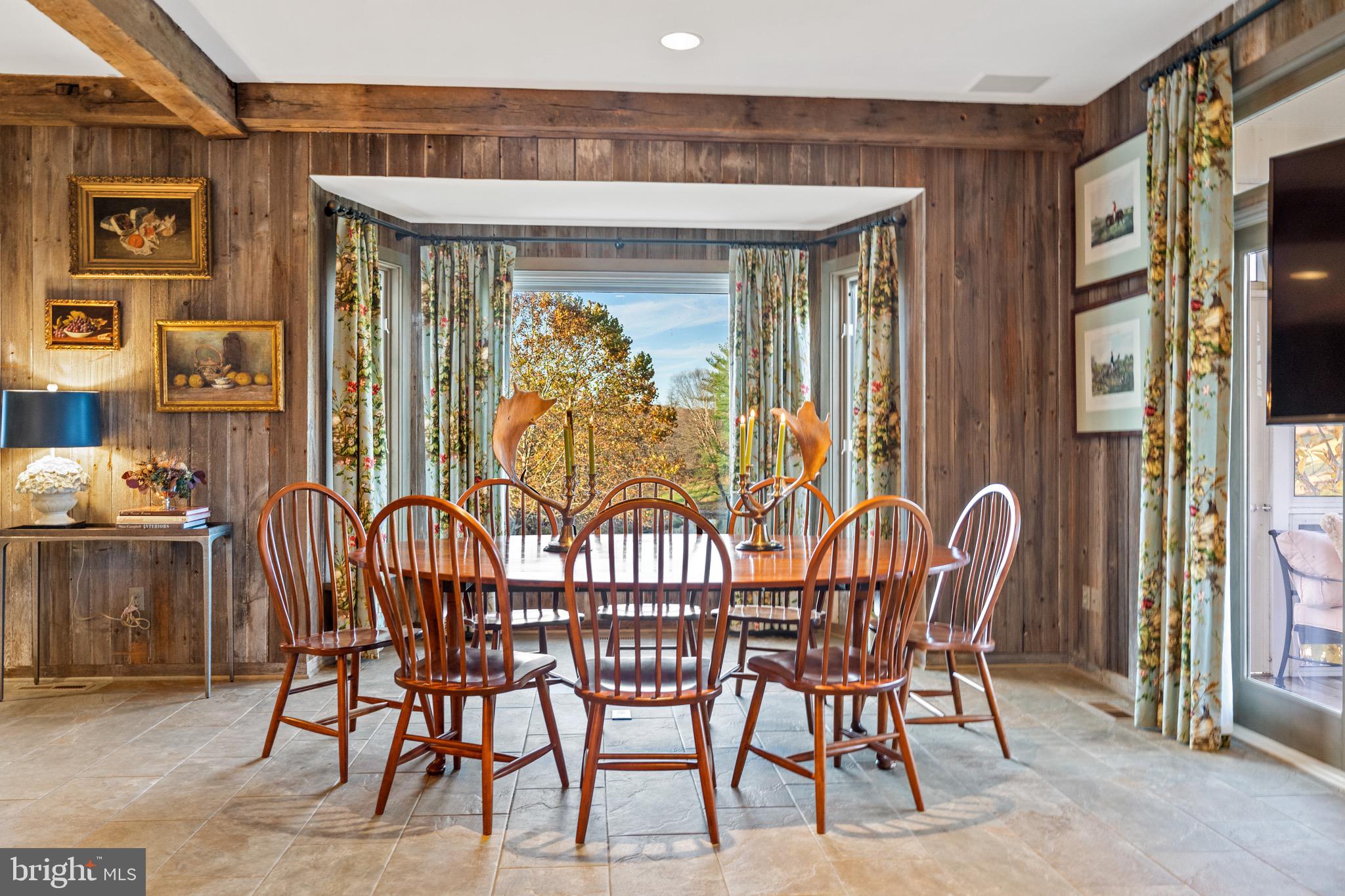 2310 Gadd Road Cockeysville, MD 21030 - Photo 31 of 83 a view of a dining room with furniture and a potted plant