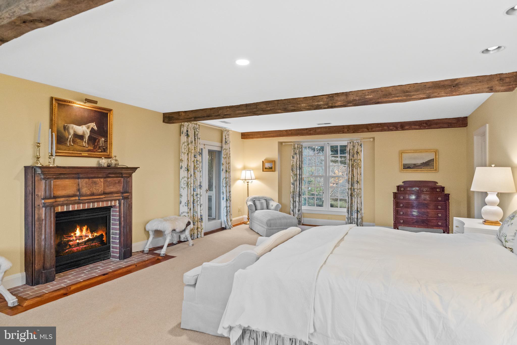 2310 Gadd Road Cockeysville, MD 21030 - Photo 44 of 83 a bedroom with a bed and glass windows