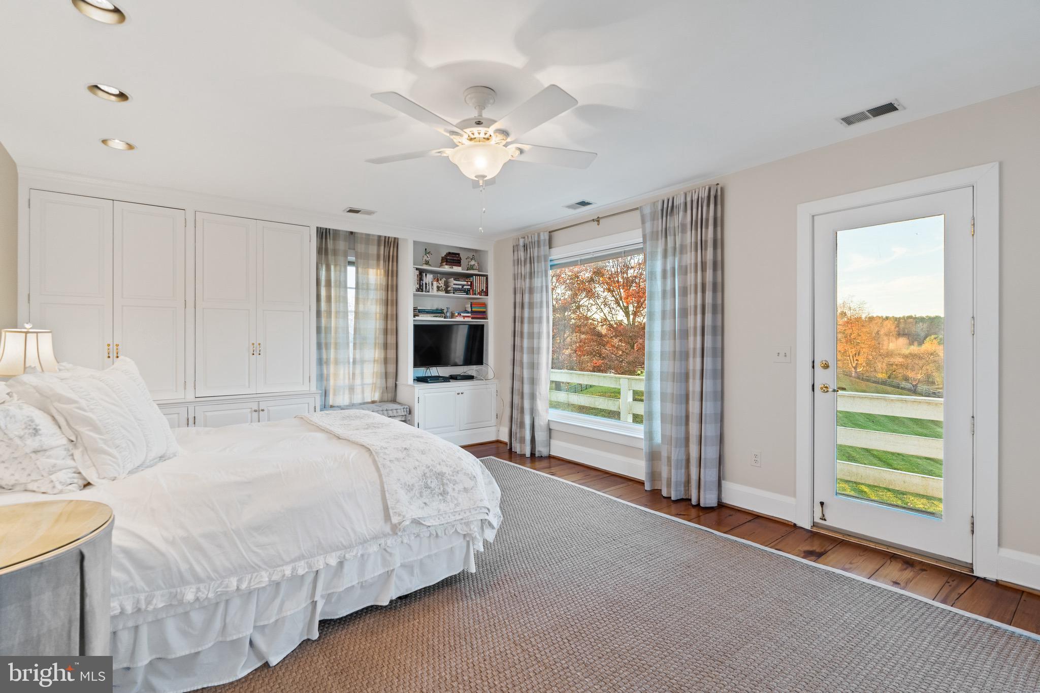 2310 Gadd Road Cockeysville, MD 21030 - Photo 58 of 83 a spacious bedroom with a large bed and a chandelier