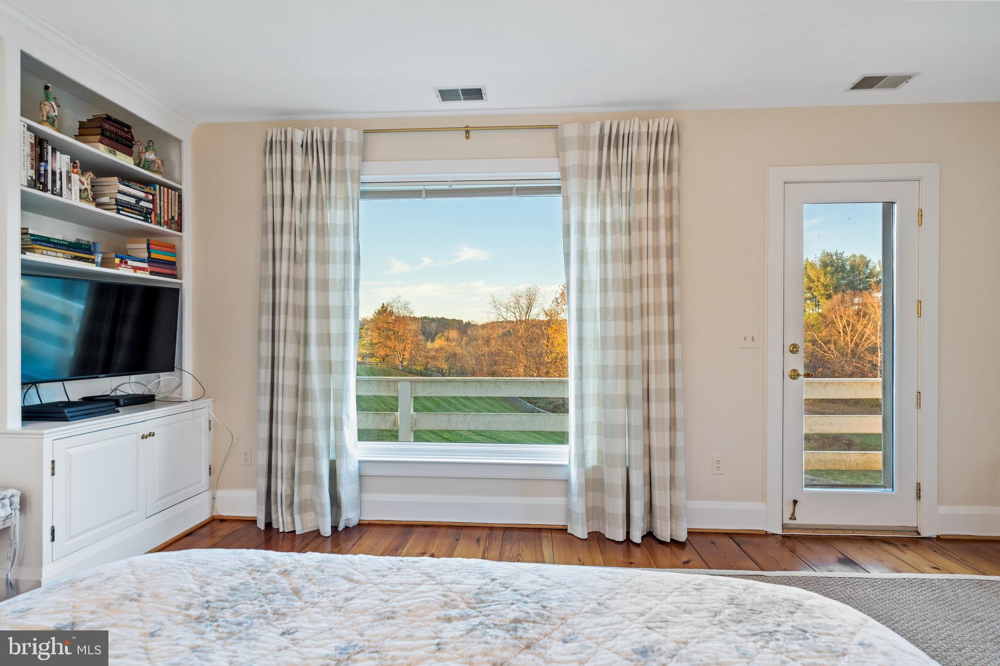 2310 Gadd Road Cockeysville, MD 21030 - Photo 59 of 83 a view of a livingroom with wooden floor and a flat screen tv