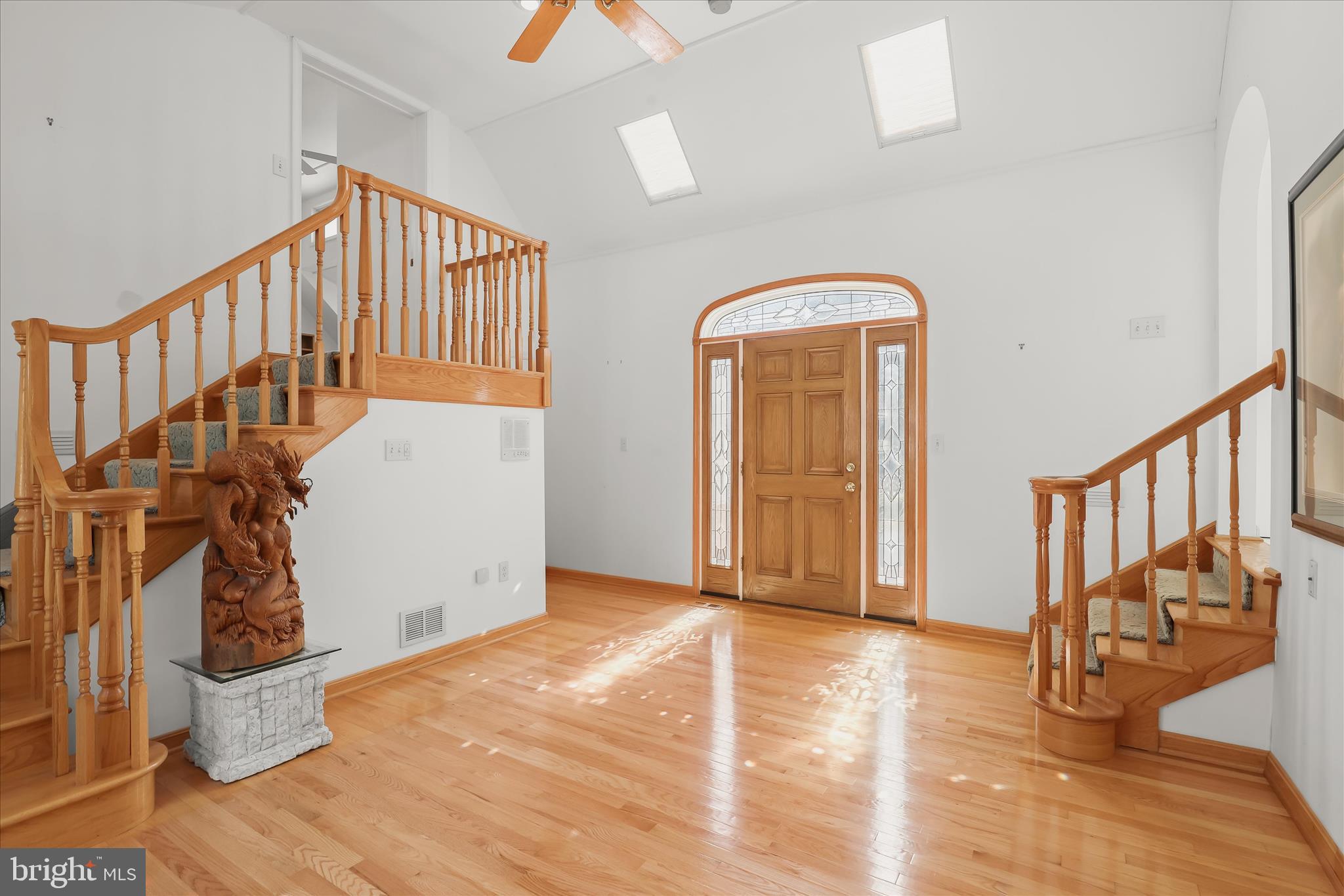 13612 Jacobs Road Mount Airy, MD 21771 - Photo 48 of 90 a view of a hallway with wooden floor and stairs