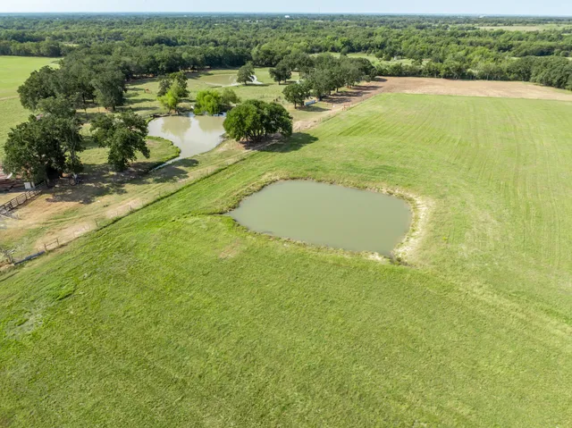 a view of a lake with a city