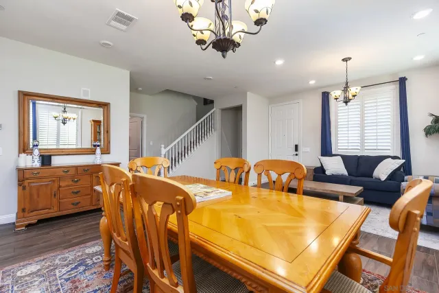 a kitchen with stainless steel appliances granite countertop a refrigerator sink and microwave