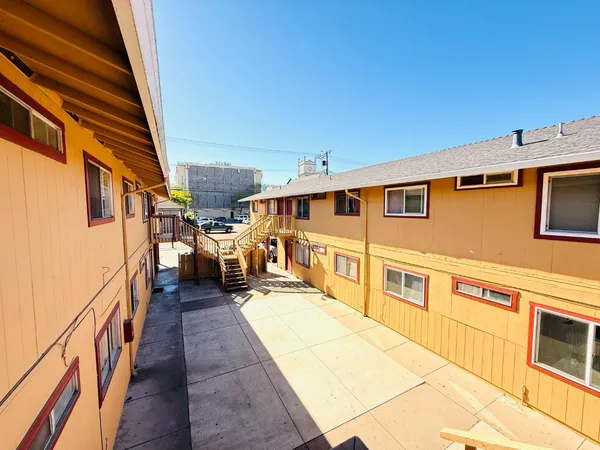 a view of a back yard of the house