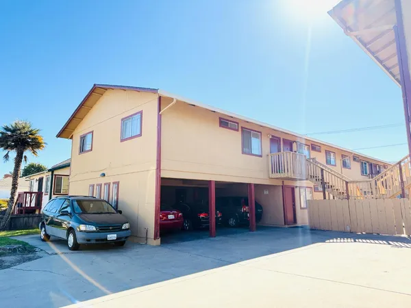 a car parked in front of a house