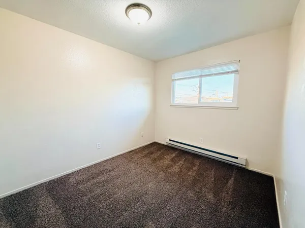 an empty room with a workbench