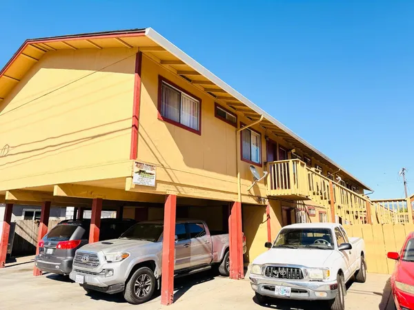 a car parked in front of a house