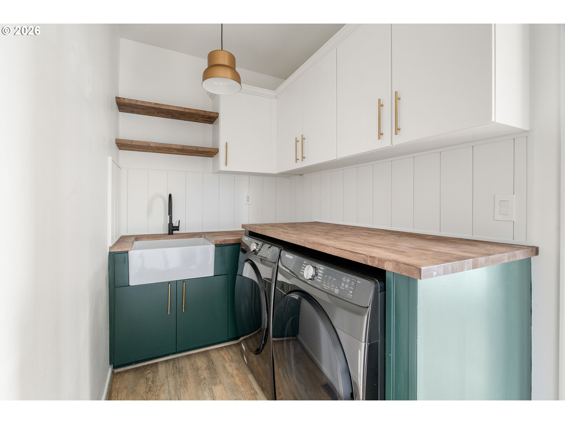 10230 Northwest Gloaming Lane Portland, OR 97229 - Photo 15 of 48 a utility room with sink dryer and washer