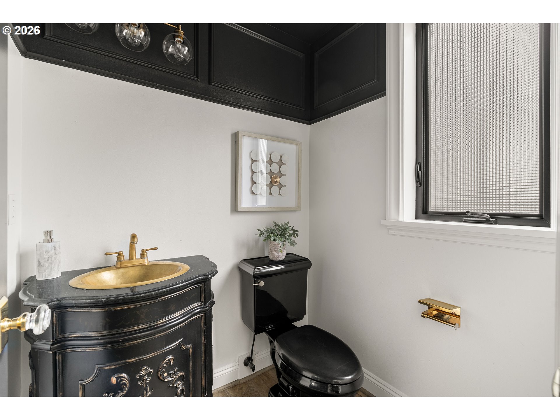 10230 Northwest Gloaming Lane Portland, OR 97229 - Photo 16 of 48 a bathroom with a sink and a mirror
