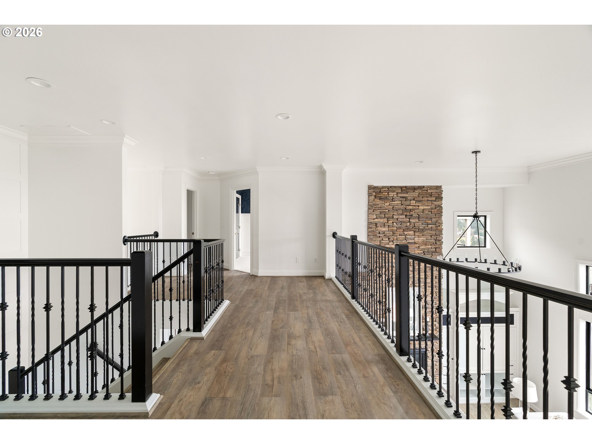 10230 Northwest Gloaming Lane Portland, OR 97229 - Photo 17 of 48 a view of a hallway with wooden floor