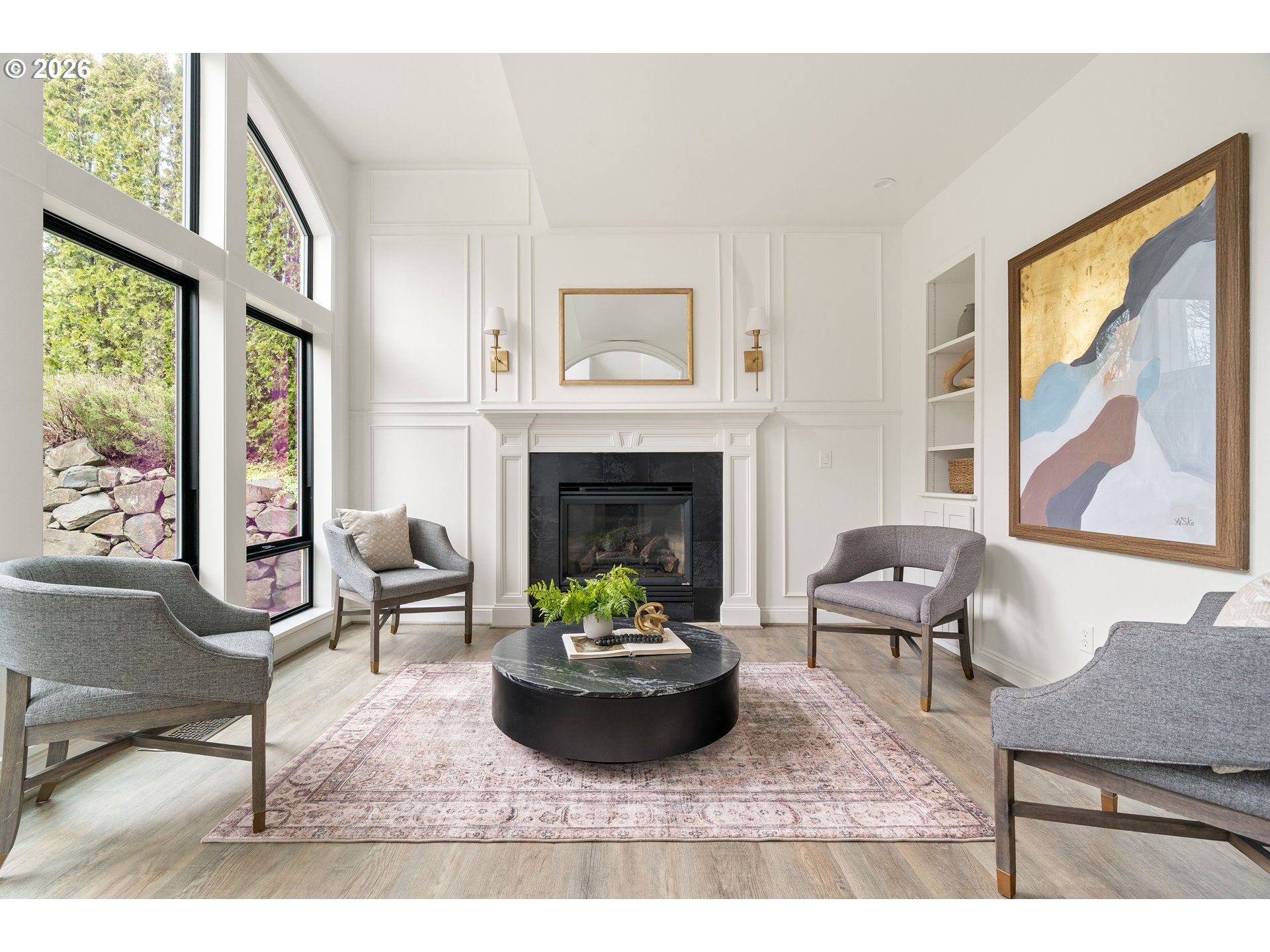 10230 Northwest Gloaming Lane Portland, OR 97229 - Photo 2 of 48 a living room with furniture and a fireplace
