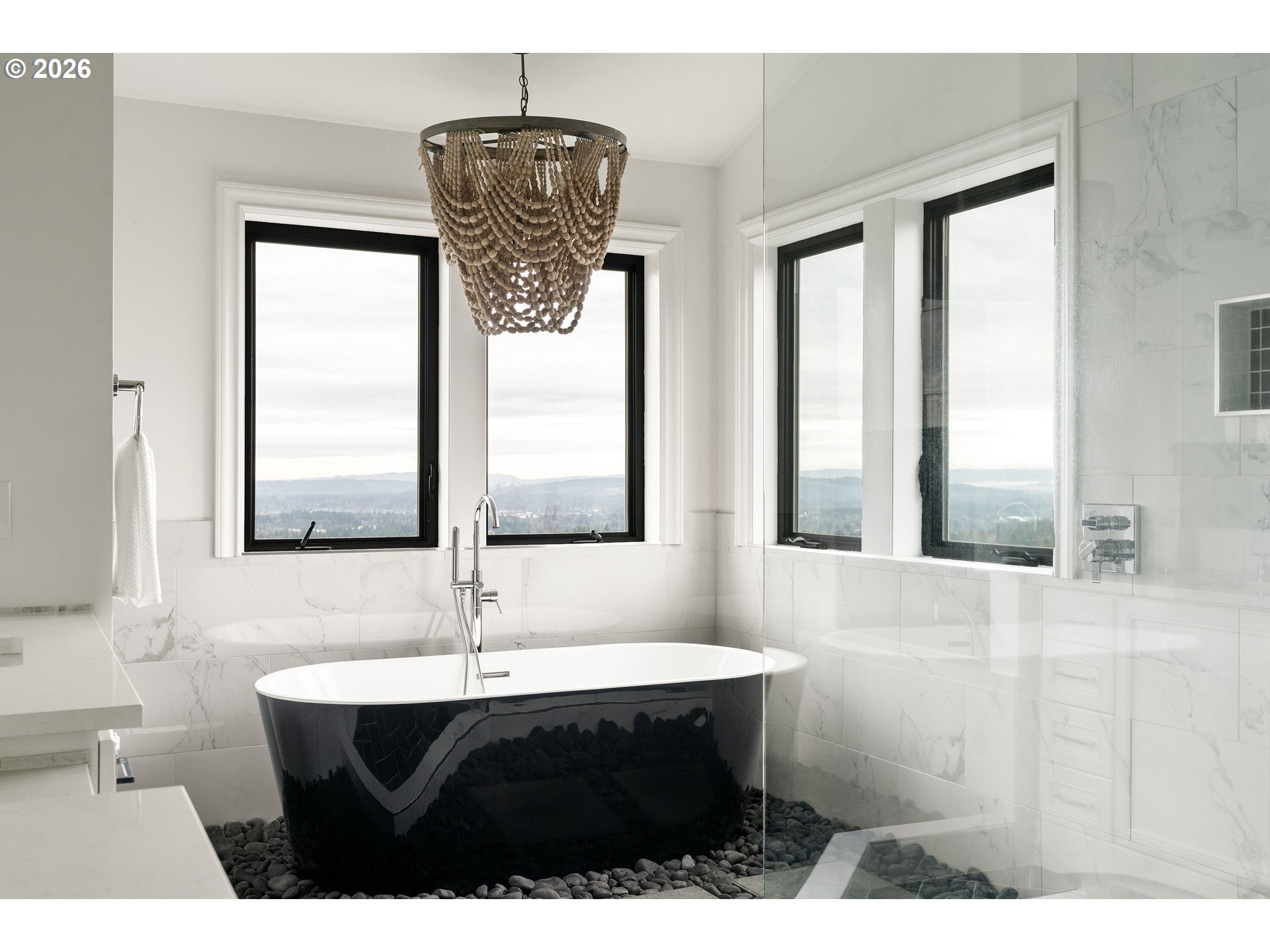10230 Northwest Gloaming Lane Portland, OR 97229 - Photo 22 of 48 a bathroom with a sink a mirror and window