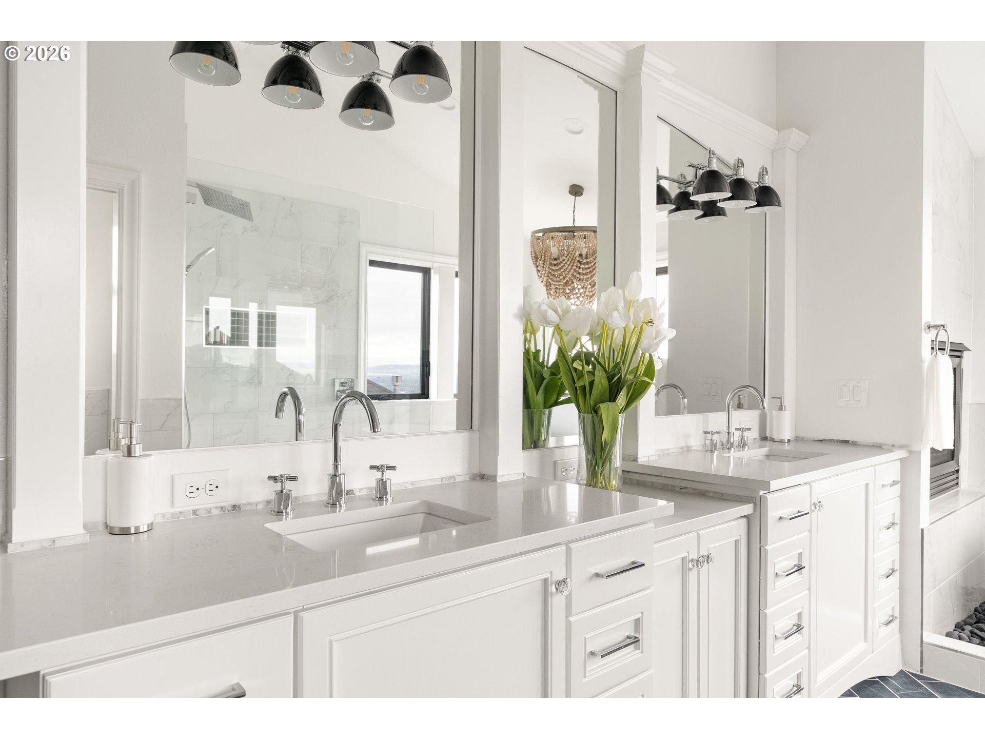 10230 Northwest Gloaming Lane Portland, OR 97229 - Photo 23 of 48 a bathroom with a sink and a mirror