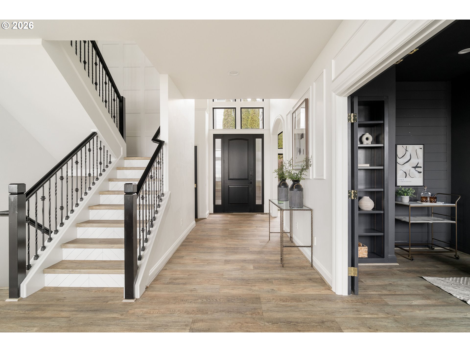 10230 Northwest Gloaming Lane Portland, OR 97229 - Photo 3 of 48 a view empty room with wooden floor and stairs