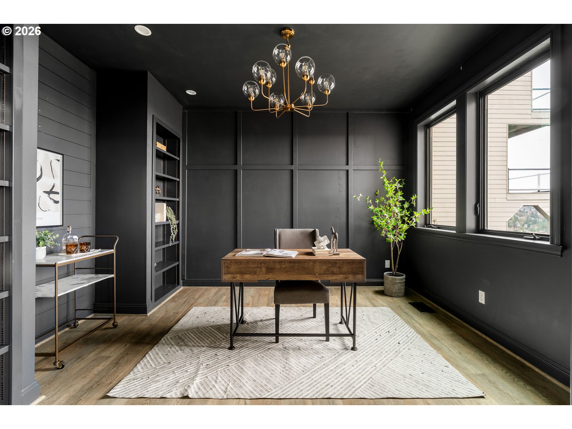 10230 Northwest Gloaming Lane Portland, OR 97229 - Photo 4 of 48 a living room with furniture and a potted plant