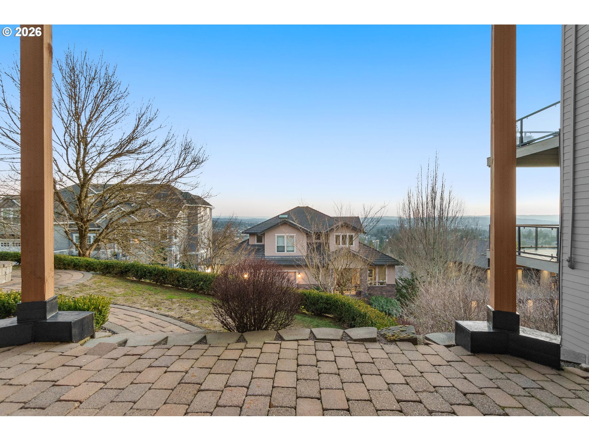 10230 Northwest Gloaming Lane Portland, OR 97229 - Photo 41 of 48 a view of a dry yard with brick wall and a large tree