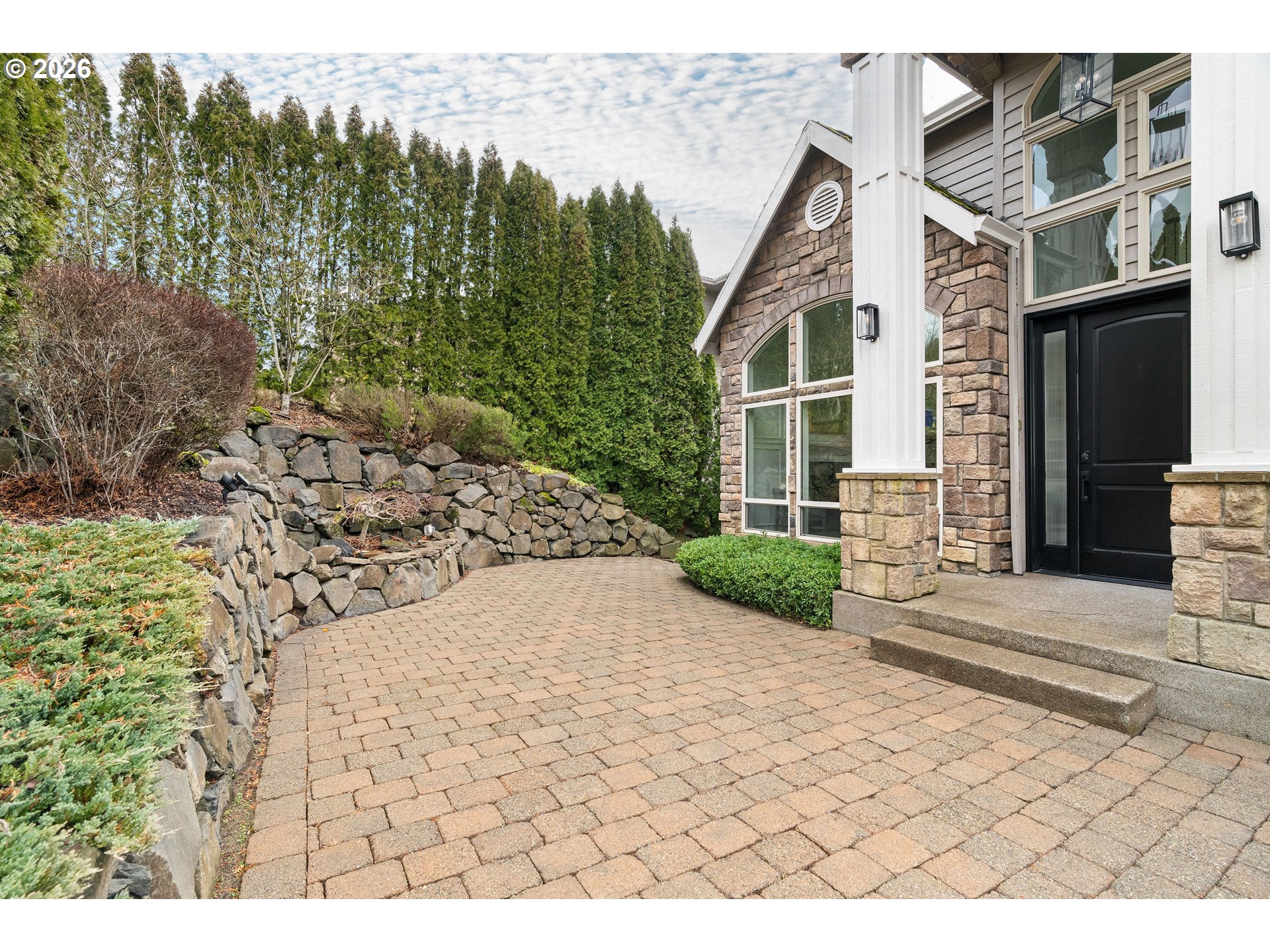 10230 Northwest Gloaming Lane Portland, OR 97229 - Photo 44 of 48 a view of a house with a yard and pathway