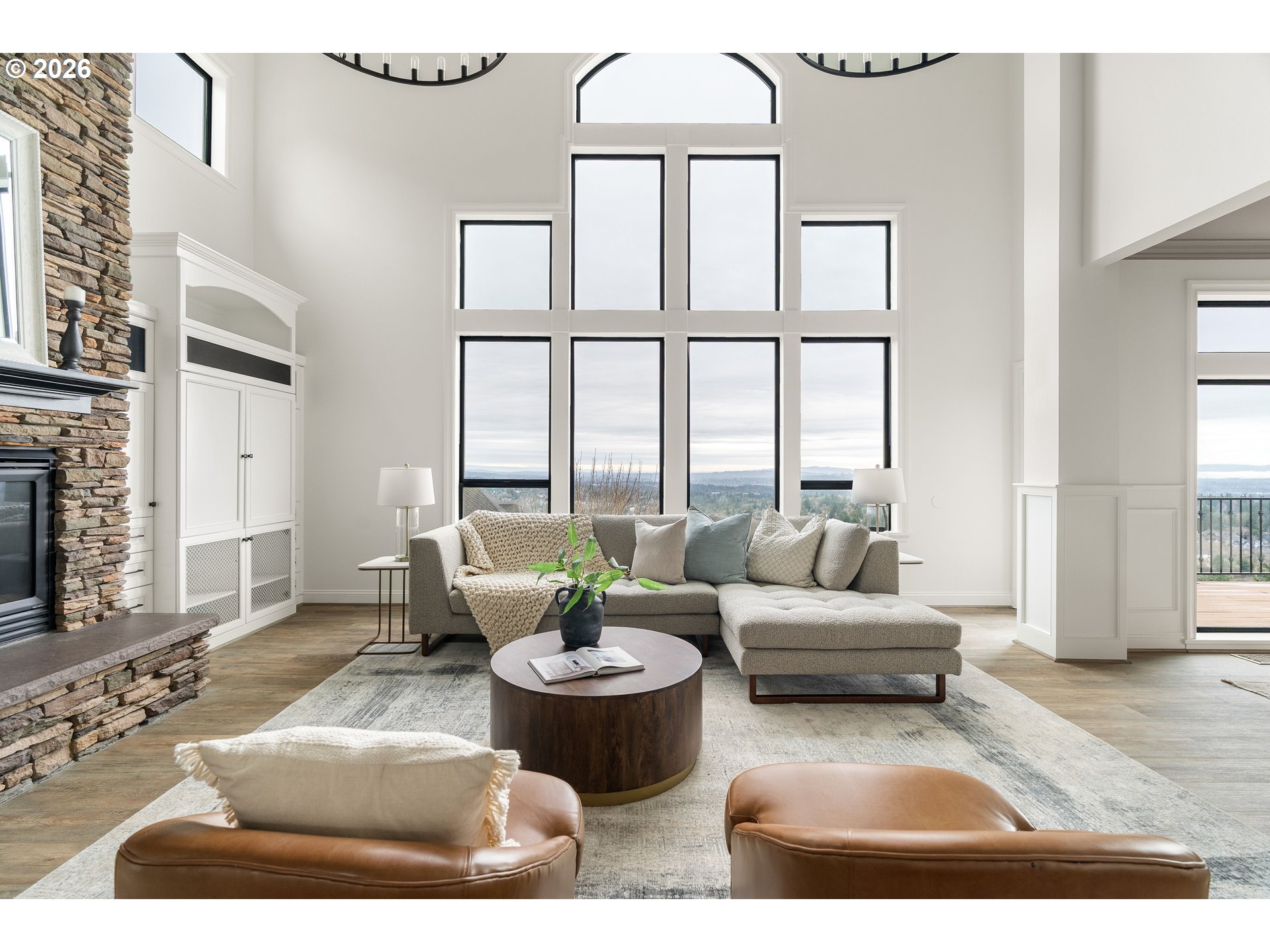 10230 Northwest Gloaming Lane Portland, OR 97229 - Photo 6 of 48 a living room with furniture and a large window