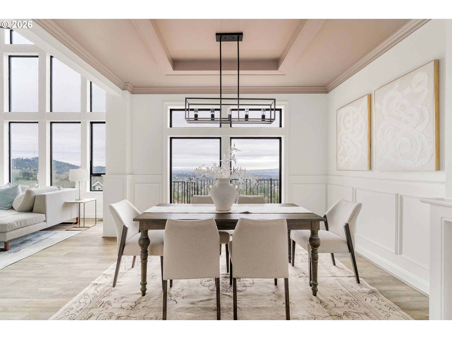 10230 Northwest Gloaming Lane Portland, OR 97229 - Photo 9 of 48 a view of a dining room with furniture wooden floor and chandelier