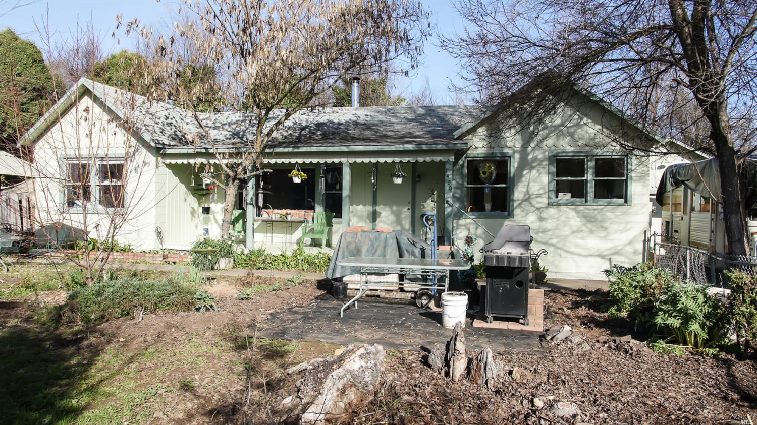 1450 Talmage Road Ukiah, CA 95482 - Photo 1 of 1 a house view with a sitting space and garden space