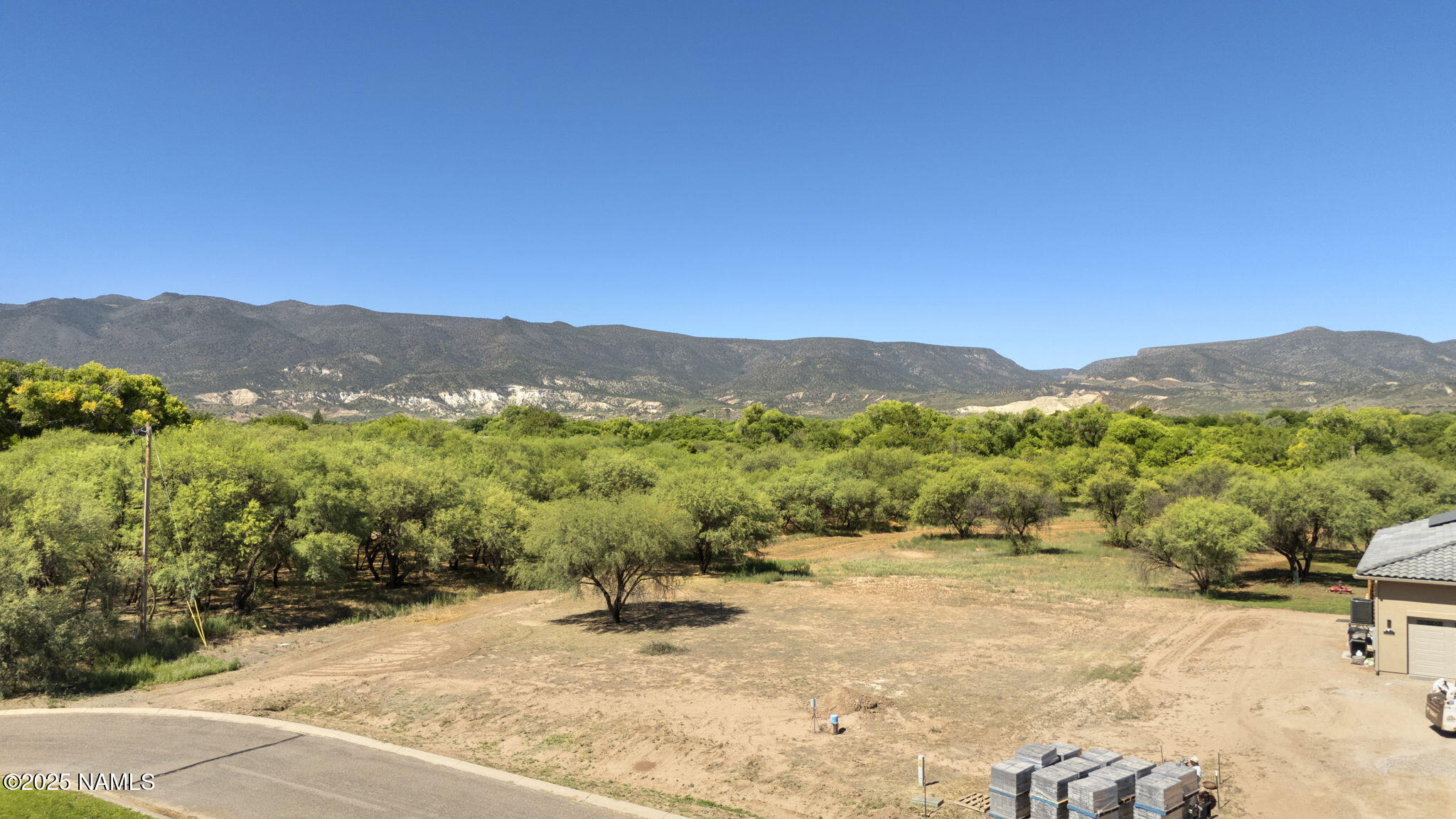 a view of a mountain with a outdoor space