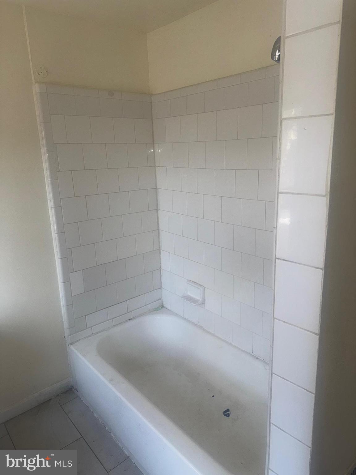 1022 North Gilmor Street Baltimore, MD 21217 - Photo 12 of 16 a bathroom with a bathtub
