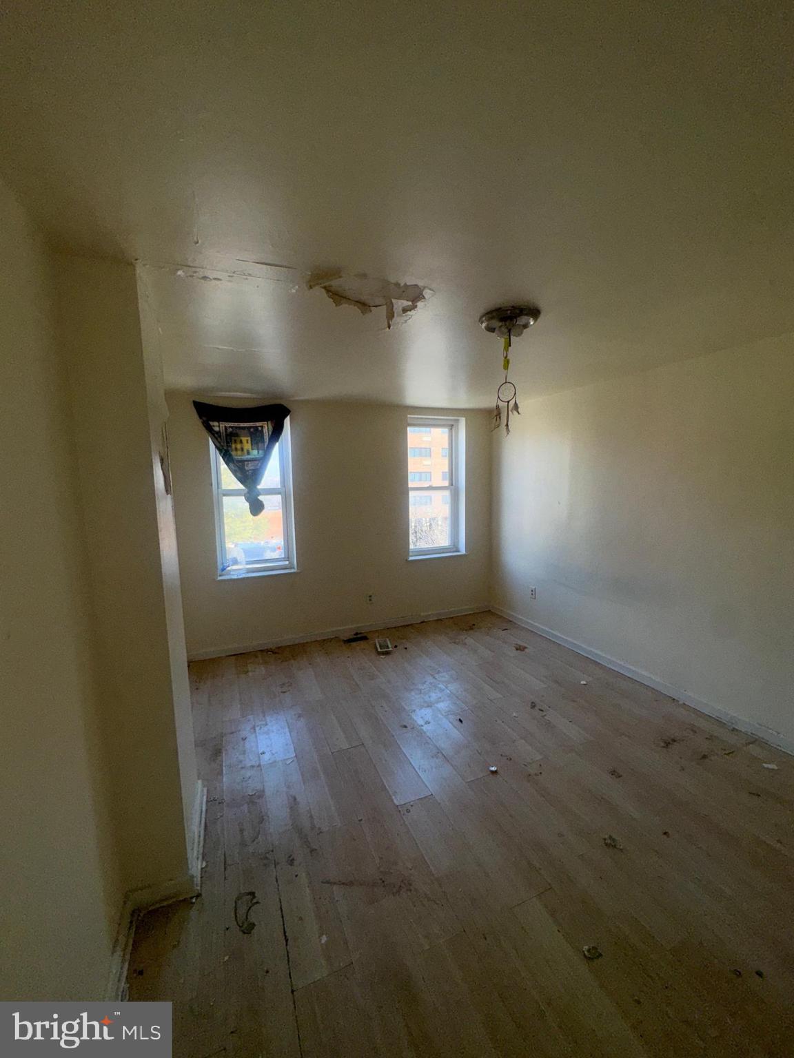 1022 North Gilmor Street Baltimore, MD 21217 - Photo 16 of 16 an empty room with windows