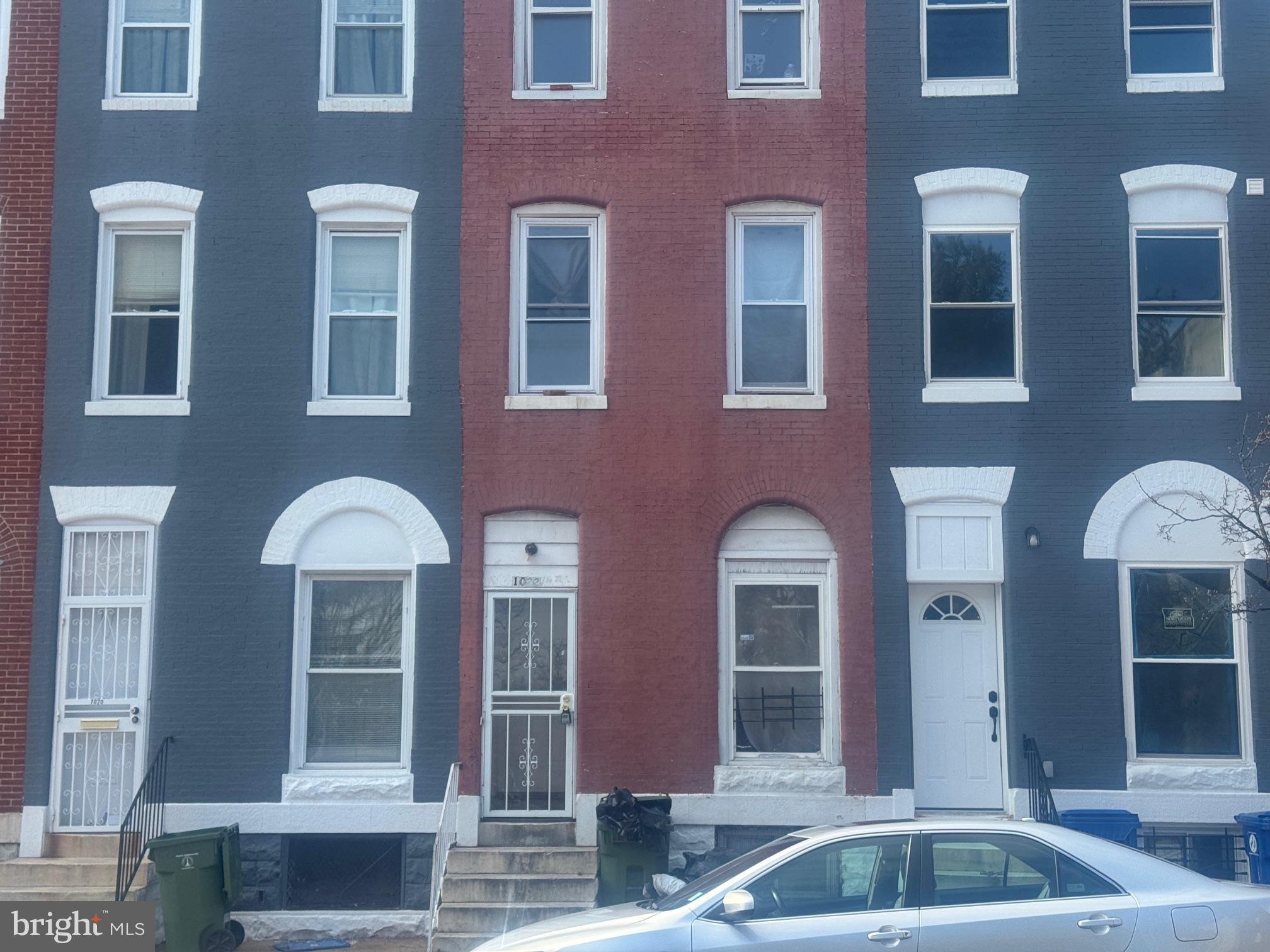 1022 North Gilmor Street Baltimore, MD 21217 - Photo 2 of 16 a front view of a house with a swimming pool