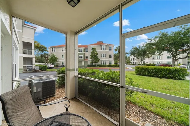 a view of balcony with furniture