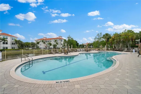 a view of a swimming pool and outdoor space