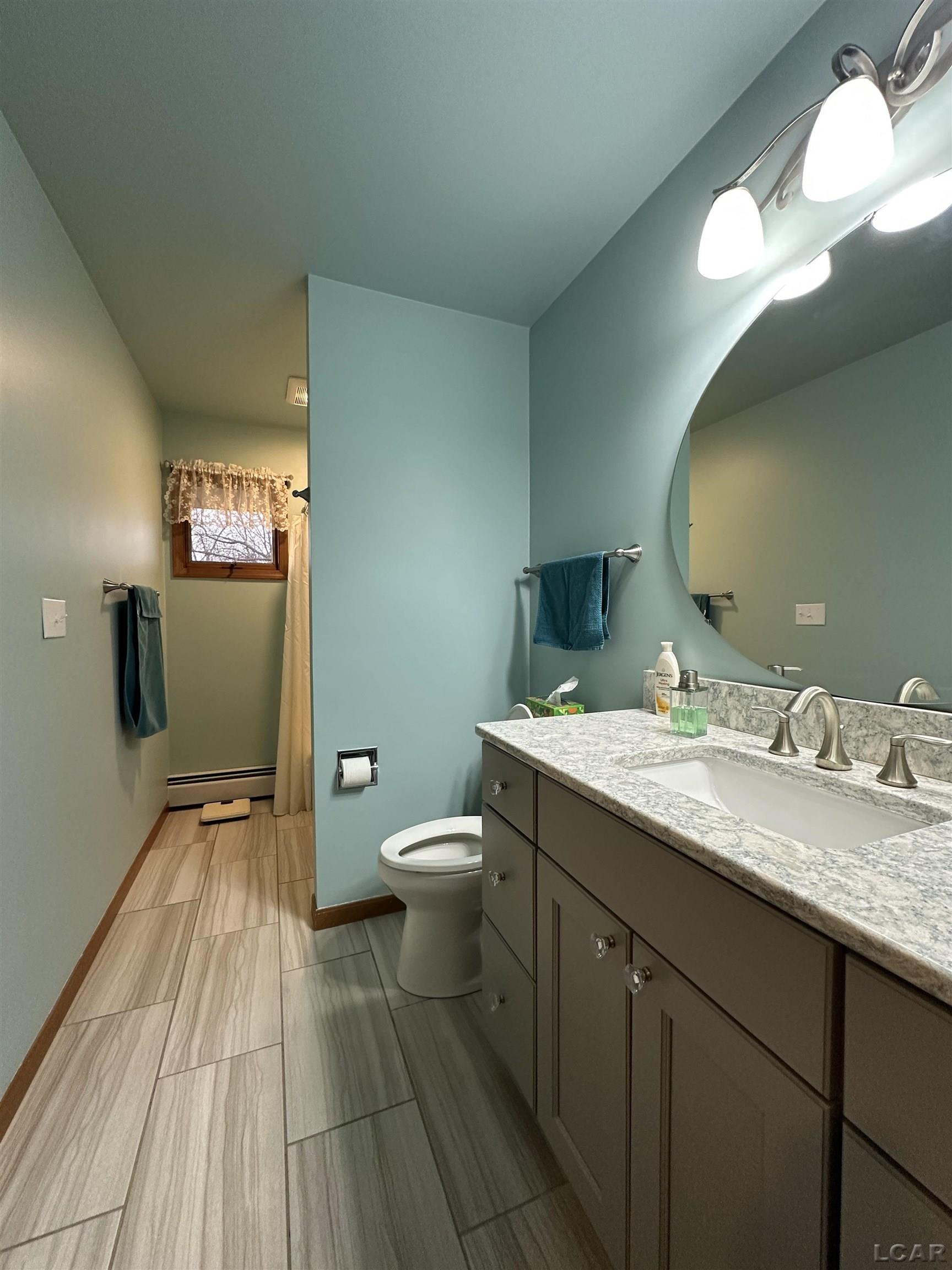 2075 Ballenberger Road Adrian, MI 49221 - Photo 17 of 40 Full bath on main floor