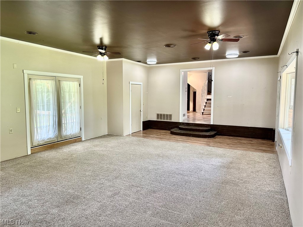 6310 Morgan Road Ravenna, OH 44266 - Photo 14 of 35 Great room with double doors to deck
