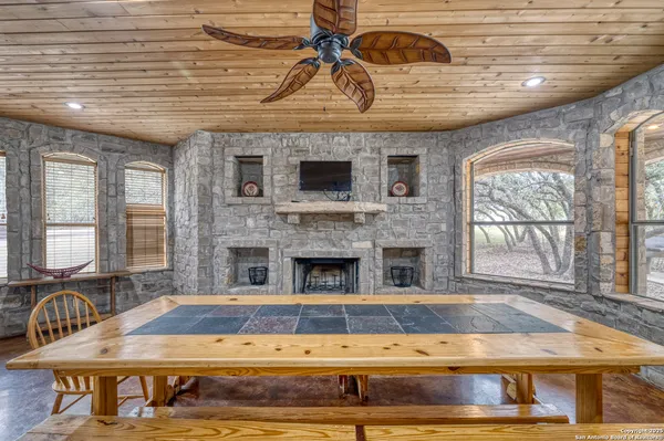 a view of hall way with furniture